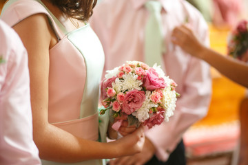 The bridesmaid with bouquet