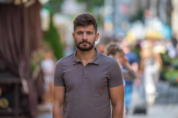 The attractive man stand and look