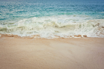 Wave of the ocean on the sand beach, Bali, Indonesia