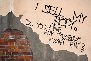 I Sell My Body - Handwritten graffiti sprayed on the wall, anarchist aesthetics - doing sex for money, prostitution, pornography, surrogacy, egg and sperm donation, black organ trade - obrazy, fototapety, plakaty