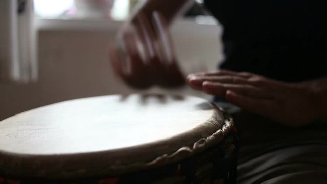congo drummer performing