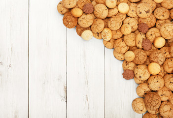 Cookies and biscuits at white wood with copy space