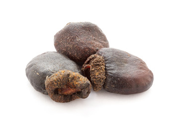 Organic dry Bhilawa (Semecarpus anacardium) seeds isolated on white background. Macro close up. Top...
