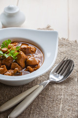 Goulash soup with pork and mushrooms.