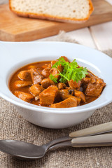 Goulash soup with pork and mushrooms.
