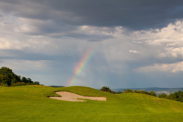 Rainbow on the empty driving range