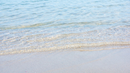 Wave of the sea on the sand beach.