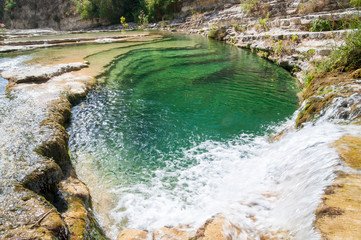 x-defaultView of a natural pool in the natural reserve of Cavagrande canyon, sicily