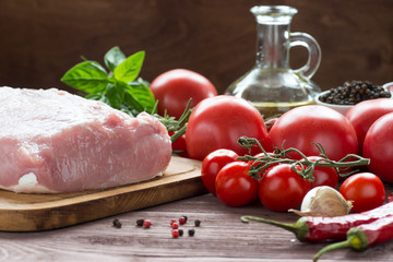 Raw pork meat with freash vegetables