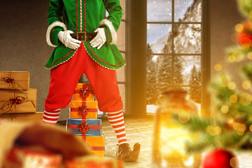 Christmas elf helper in festive decorated room with gifts and holiday decorations. Warm and magical...