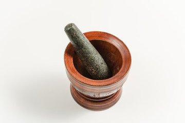 wood mortar and rock pestle isolated on white backgorund