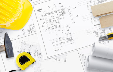 House construction project and tools. Top view on the desk of architect or builder.