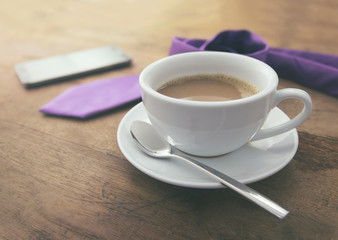 coffee cup on wood table background
