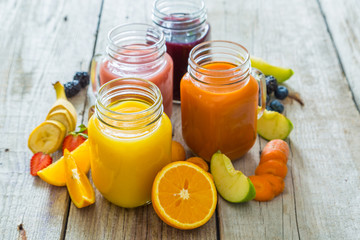 Slection of fresh fruit juices in jars
