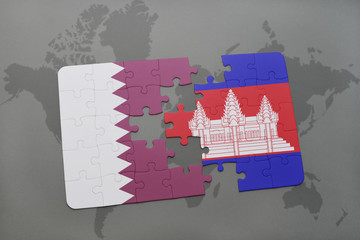 puzzle with the national flag of qatar and cambodia on a world map background.