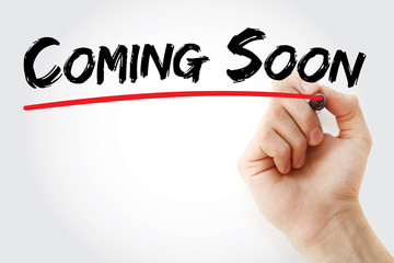 Hand writing Coming Soon with marker, concept background