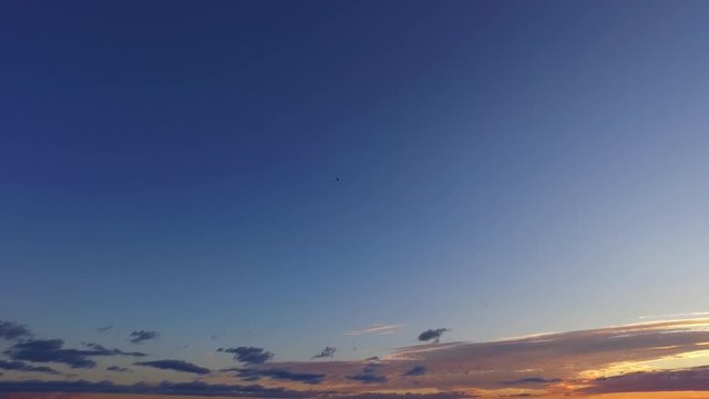 Beautiful sunset, small boats, marina, islands. Perfect evening to enjoy romantic moments.