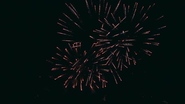 Colourful fireworks exploding. Slow motion, high speed camera, 250fps