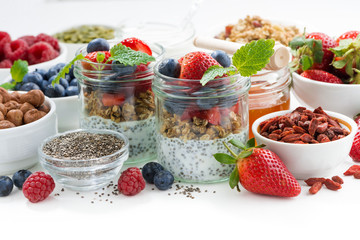 Breakfast in a jar, chia with berries and oat flakes 
