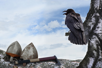 historical background with bird - raven and ancient weapons