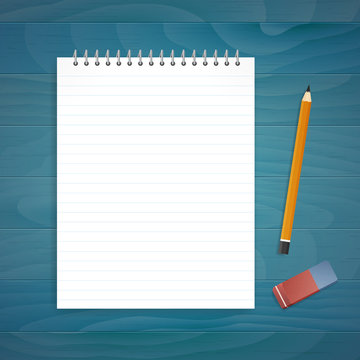 Notepad with pencil and eraser on wood blue plank desk