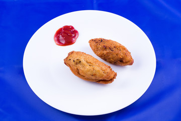 Indian food - bread roll with fish stuffing