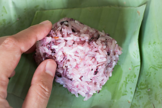 Cooked sticky rice-berry on banana leaf