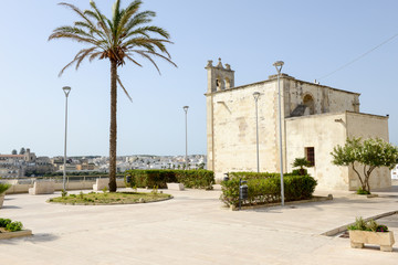 Fototapeta na wymiar Beautiful town of Otranto and its beach on Salento peninsula