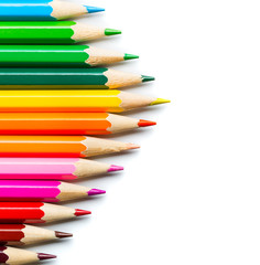 Colored pencils on white background