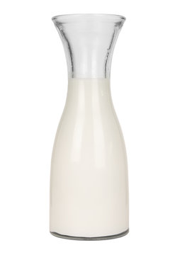 A vintage style glass bottle of milk isolated on a white background