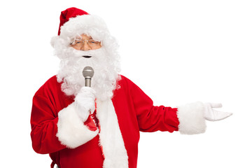 Fototapeta na wymiar Santa Claus speaking on a microphone