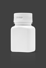 blank packaging medicine plastic bottle isolated on gray