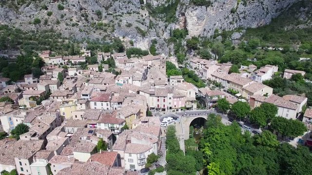 France, Alpes-de-haute-provence,  Aerial view of Moustiers-Sainte-Marie labelled Les Plus Beaux Villages de France (The Most Beautiful Villages of France), 4K UHDV movie (3840X2160)