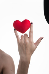 I Love You language hand sign with holding heart symbol in hands