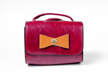 Red leather bag isolated on white background.