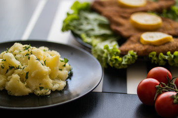 potato salad with schnitzel at restaurant.
