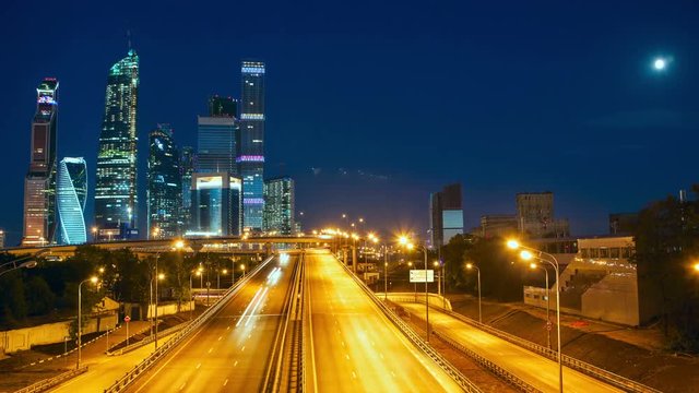 Moscow City At Night With Moon, Moscow International Business Center. Timelapse UHD 4K 3840x2160. 30 fps 