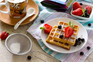 Traditional Belgian waffles with cream whipped cream and fresh b