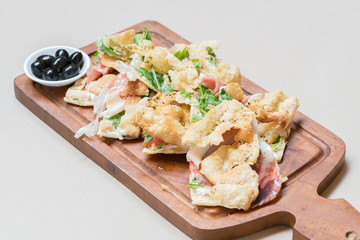 Pizza with parma ham and rockets
