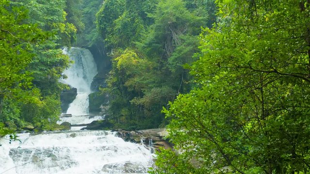 Video 1920x1080 - Big waterfall among the trees. Chiang Rai, Thailand