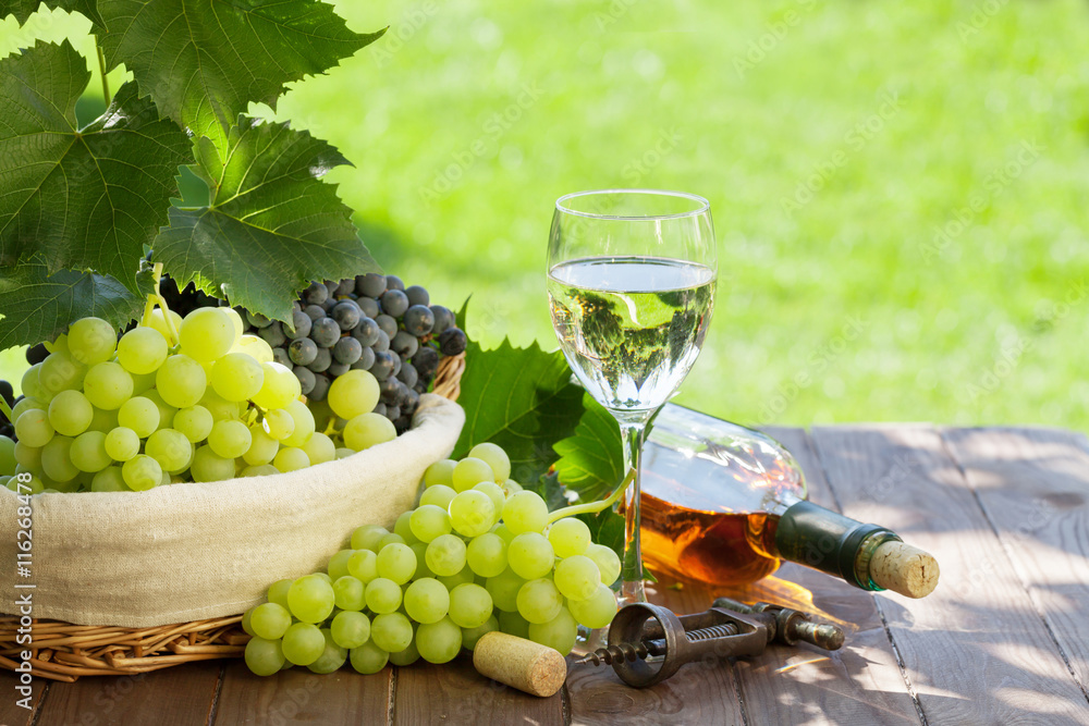 Wall mural white wine bottle and glass, red and white grape