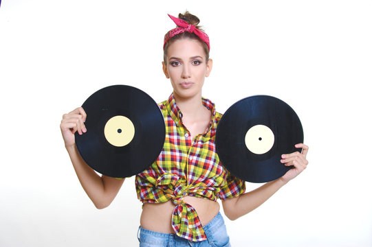 pin up vintage fashion style girl holding retro big vinyl music, isolated on white