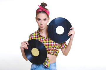 pin up vintage fashion style girl holding retro big vinyl music, isolated on white 