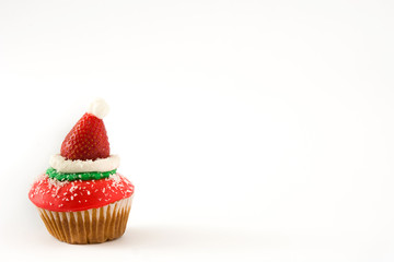 Santa hat cupcake isolated on white background

