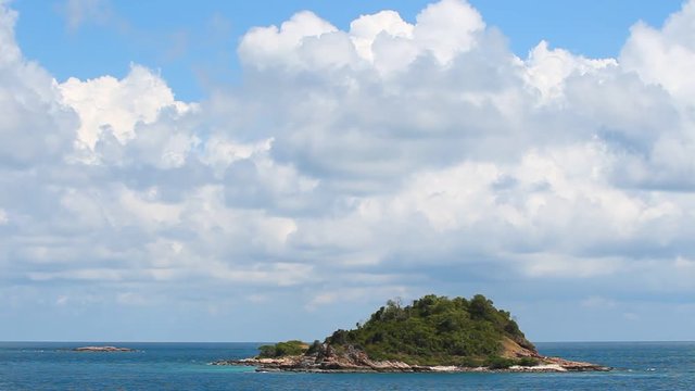 beautiful deserted island in the tropical sea with big cloud at summer time, high definition, Full HD, 1920x1080