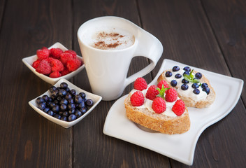 Sandwich with berries. Healthy breakfast.