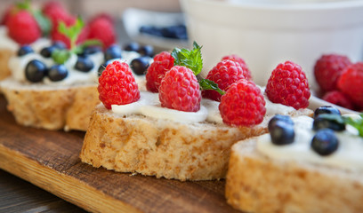 Sandwich with berries. Healthy breakfast.
