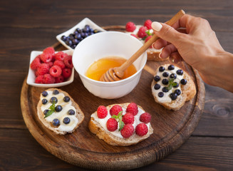 Sandwich with berries. Healthy breakfast.