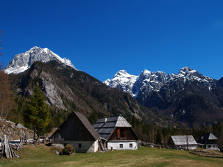 Traditional Alpine farmhouses in the mountains