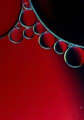 Abstract macro background of red and black bubbles in water. - 116273032